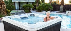 island spas hot tub with a woman relaxing
