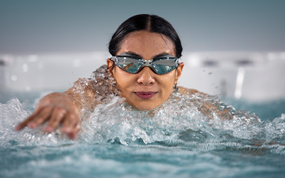 Woman swimming in TidalFit with WaVS true variable speed system
